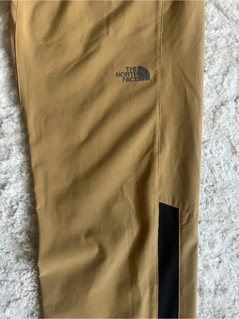 The North Face Men’s ESSENTIAL Track/Running pants in Tan with Black Accents